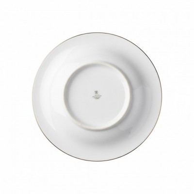 Assiette en porcelaine bordure dorée